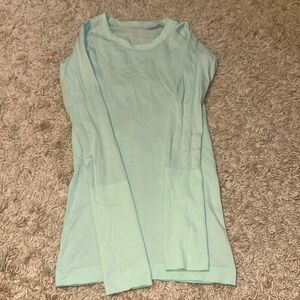 Lululemon size 2 long sleeve swiftly tech mint blue/green color